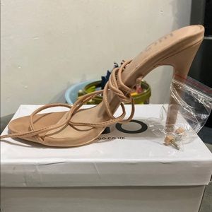 Nude high heels in fabrics material